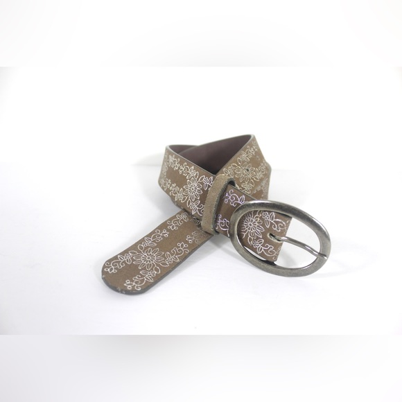 Beige Sueded Belt with Silver Embossed Floral Pattern and an Oval Silver Buckle - Picture 2 of 9